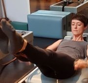 Christine Bowen demonstrating a reformer exercise