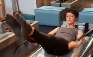 Christine Bowen demonstrating a reformer exercise